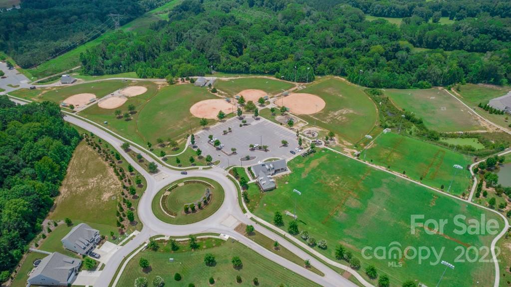 79109 Ridgehaven Road Lancaster, SC 29720 - Photo 46 of 48 an aerial view of a golf course with swimming pool and outdoor seating