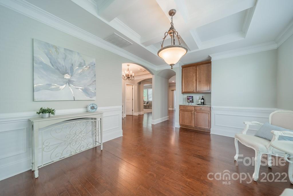 79109 Ridgehaven Road Lancaster, SC 29720 - Photo 5 of 48 a view of a living room and kitchen with wooden floor