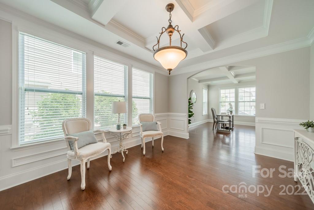 79109 Ridgehaven Road Lancaster, SC 29720 - Photo 6 of 48 a view of a dining room with furniture wooden floor and chandelier