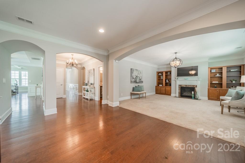 79109 Ridgehaven Road Lancaster, SC 29720 - Photo 8 of 48 a view of a livingroom with furniture wooden floor and a fireplace