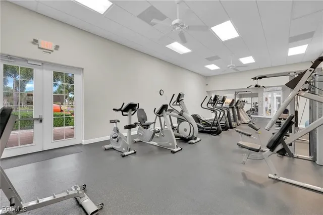 an aerial view of residential houses with outdoor space and river