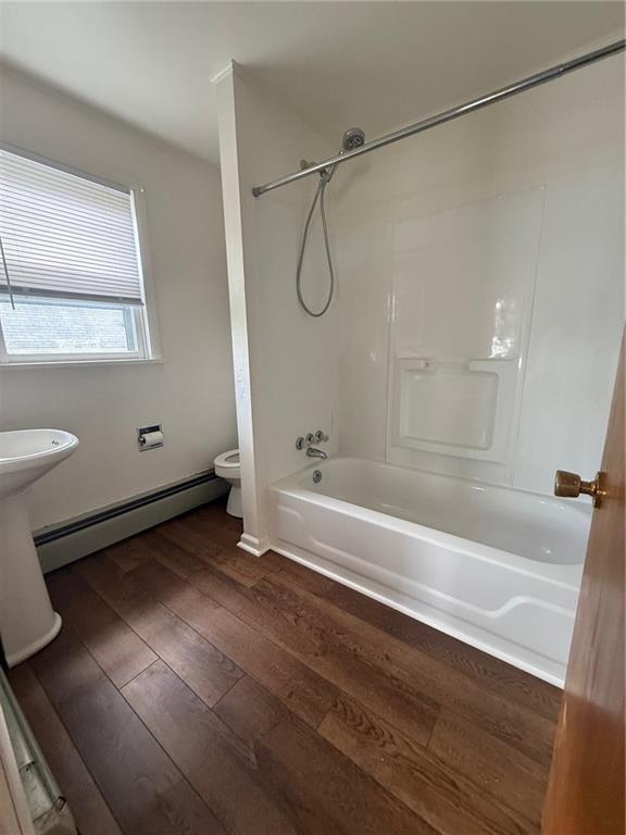 192 Elm Street Washington, PA 15301 - Photo 5 of 11 a bathroom with a bathtub a toilet and a shower