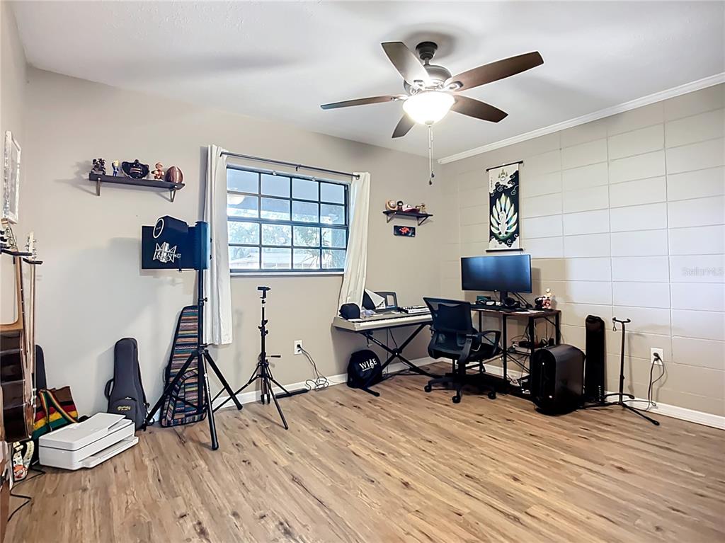 1304 Alfred Street, Unit A Brandon, FL 33510 - Photo 18 of 25 a view of a workspace with furniture and a window