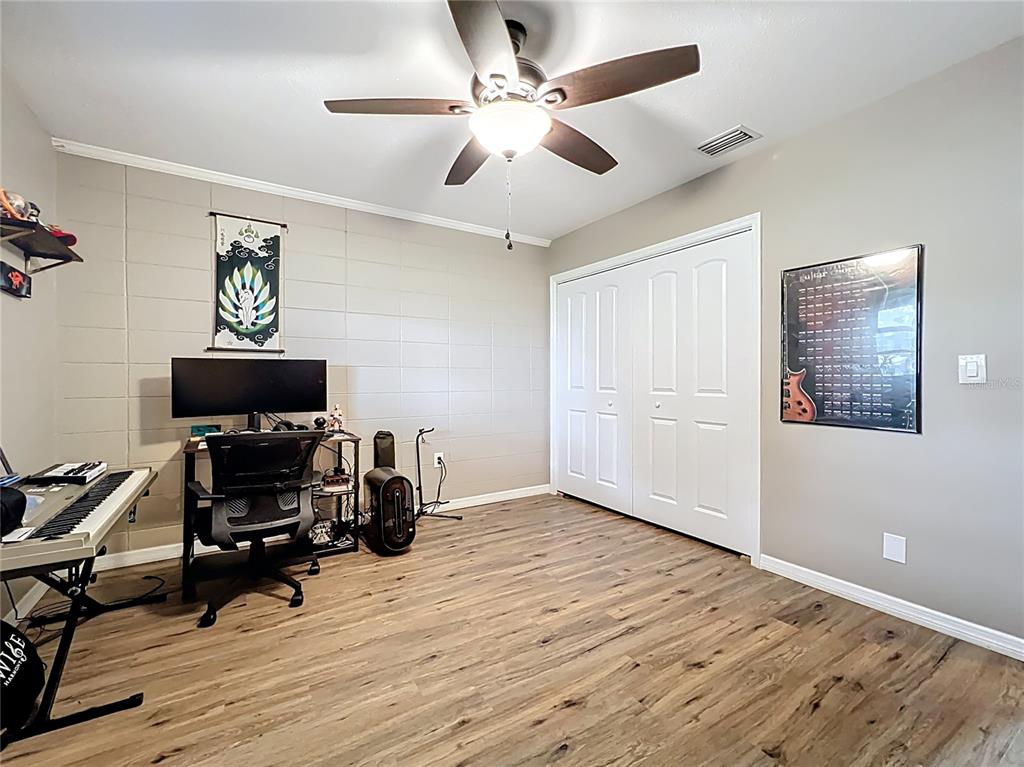 1304 Alfred Street, Unit A Brandon, FL 33510 - Photo 19 of 25 a living room with furniture and a wooden floor