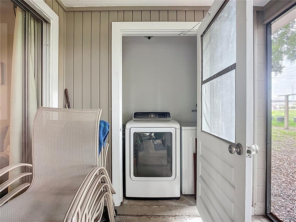1304 Alfred Street, Unit A Brandon, FL 33510 - Photo 24 of 25 a utility room with a window dryer and washer