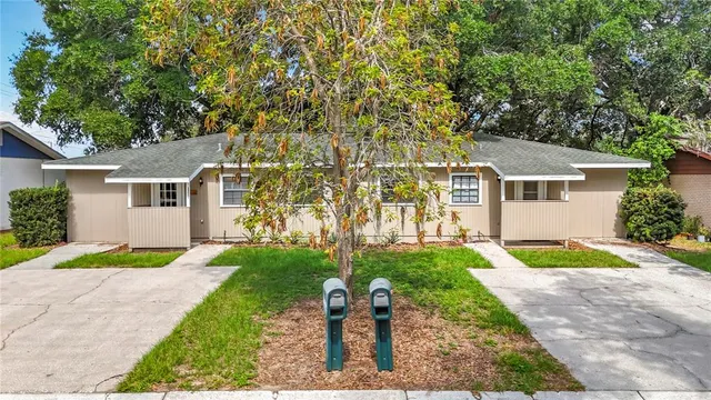 front view of a house with a yard