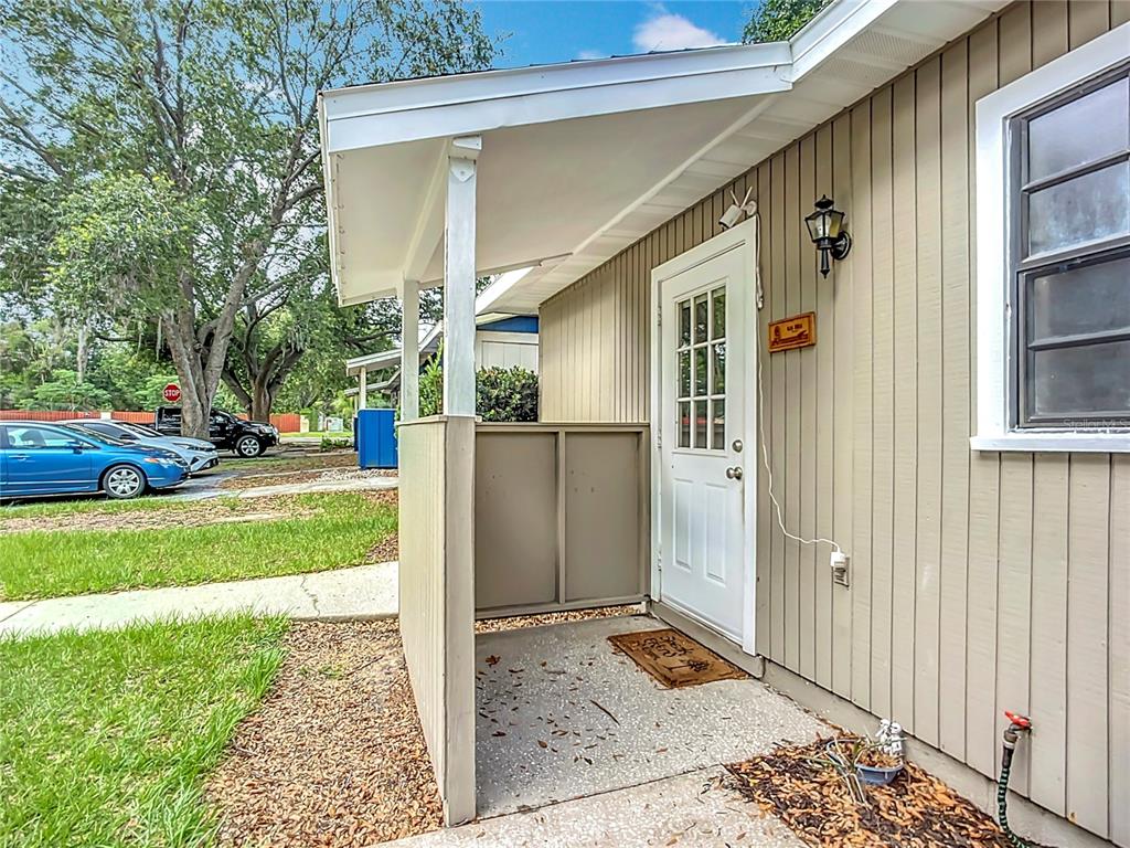 1304 Alfred Street, Unit A Brandon, FL 33510 - Photo 8 of 25 a view of a house with a yard