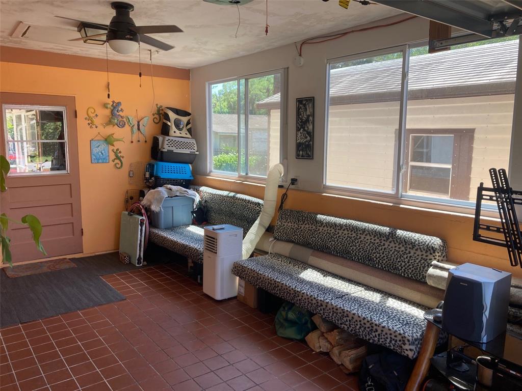 1126 Stevens Avenue DeLand, FL 32720 - Photo 22 of 38 a living room with furniture and a window