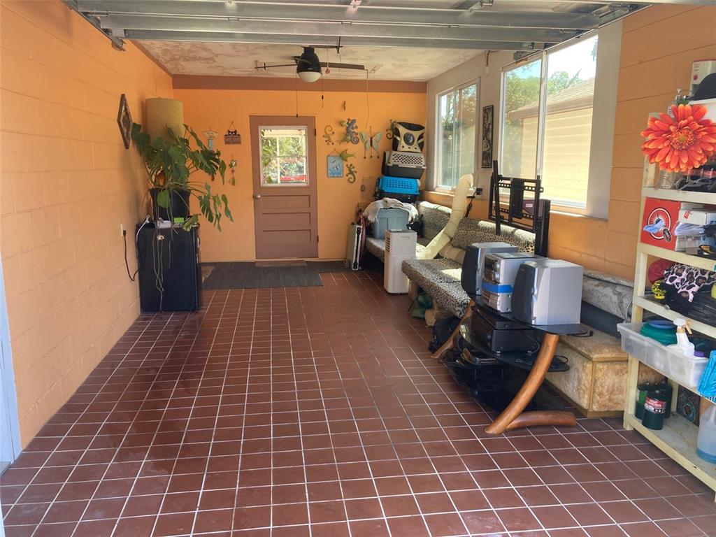 1126 Stevens Avenue DeLand, FL 32720 - Photo 23 of 38 a living room with furniture and a window