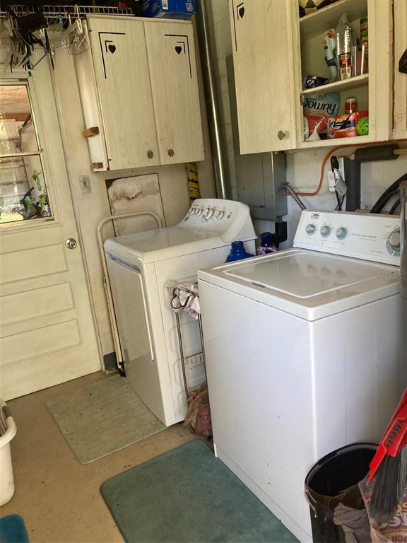 1126 Stevens Avenue DeLand, FL 32720 - Photo 25 of 38 a utility room with dryer and washer