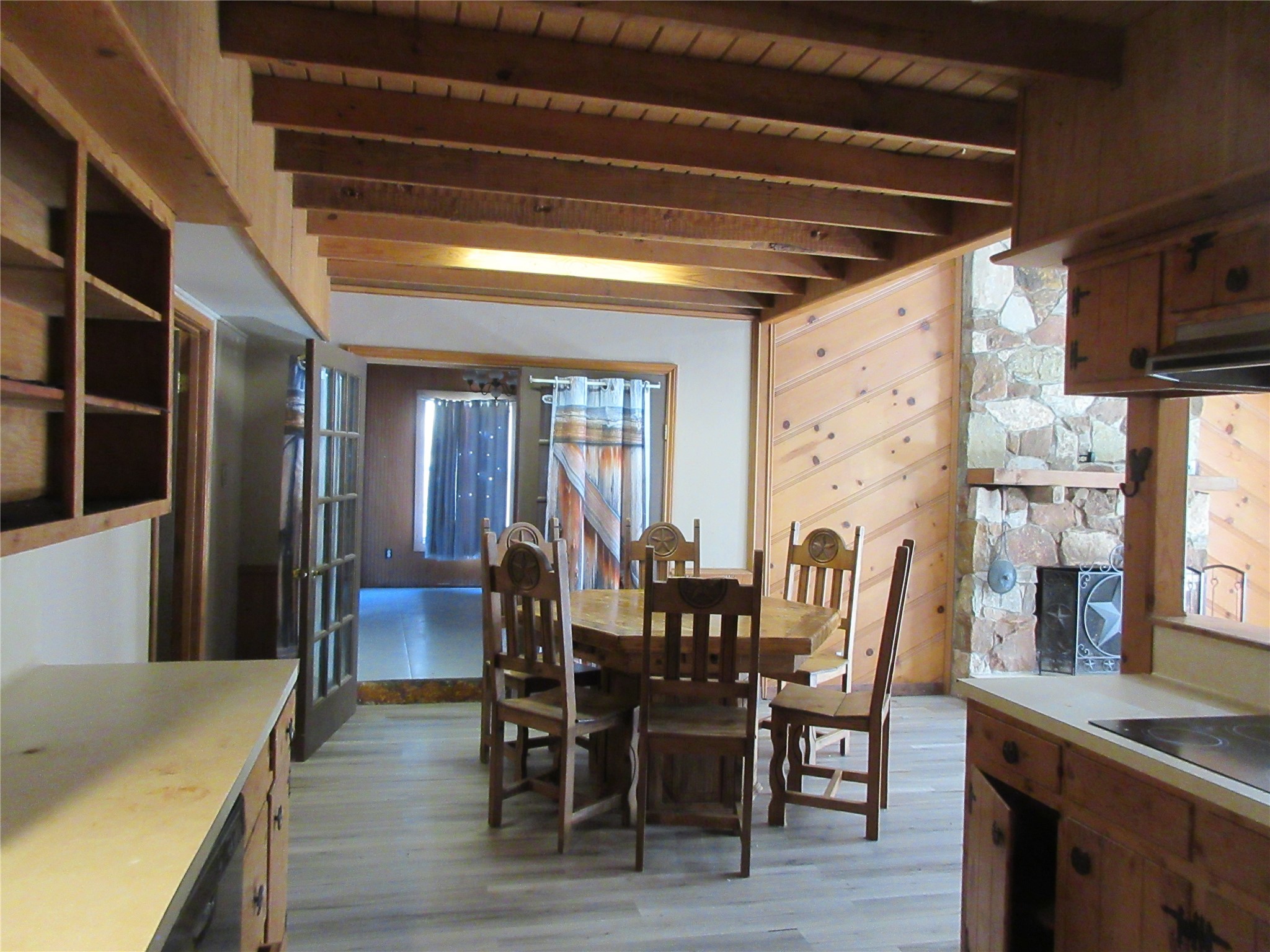 11931 Willis Waukegan Road Conroe, TX 77303 - Photo 7 of 20 View from kitchen towards dining area and secondary bedrooms