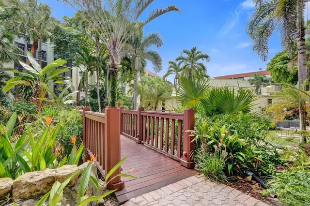 a view of a garden with pathway