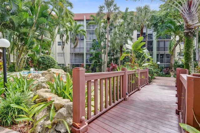 a view of a garden with pathway