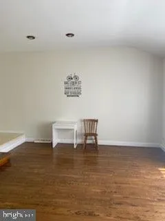 a view of table and chair in the room