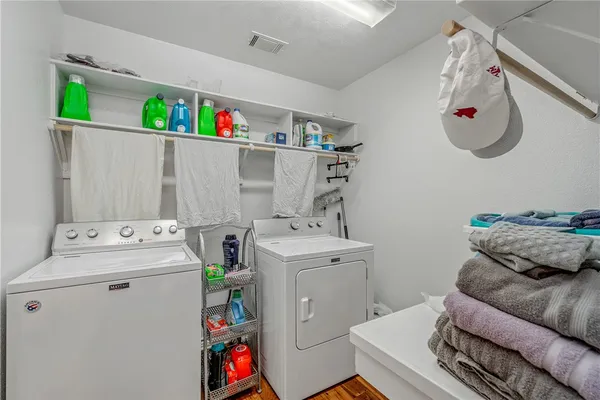 a utility room with dryer and washer