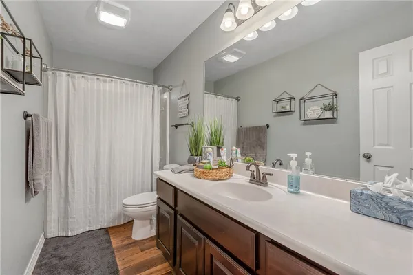 a view of bathroom with dual sinks