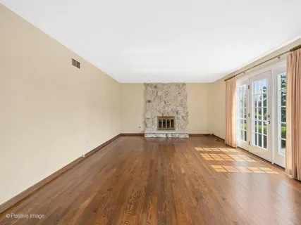 a spacious bedroom with a large bed and a couch