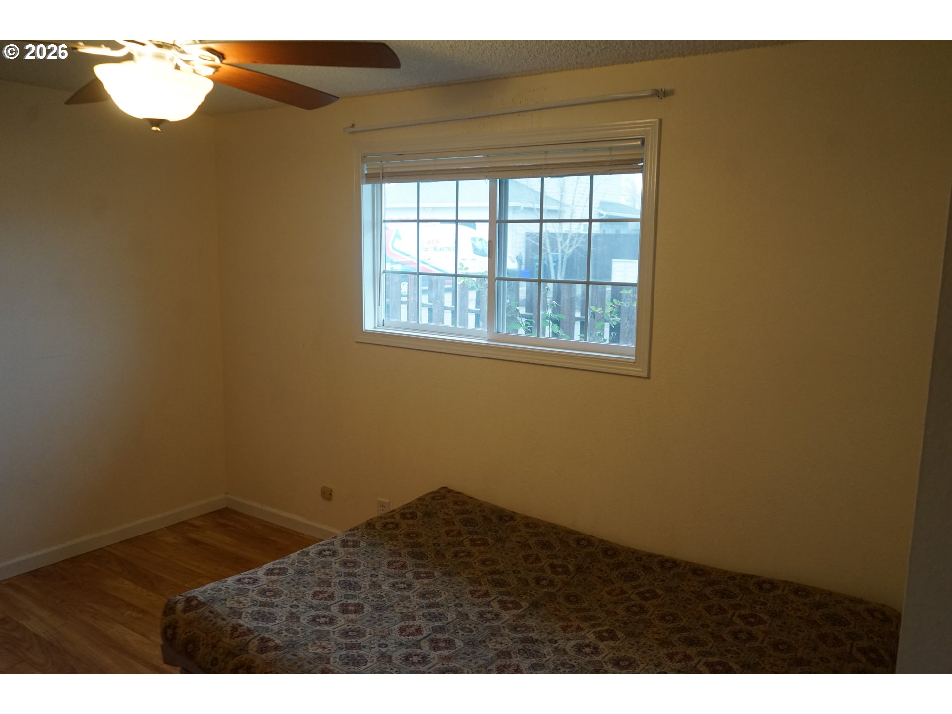 802 54th Place Springfield, OR 97478 - Photo 15 of 27 a view of an empty room and window