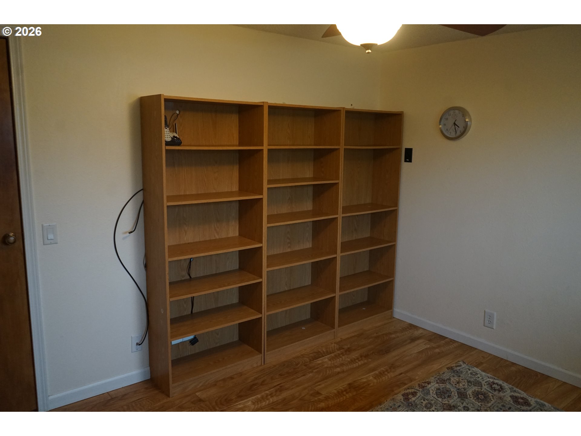 802 54th Place Springfield, OR 97478 - Photo 16 of 27 a view of an empty room with empty shelves