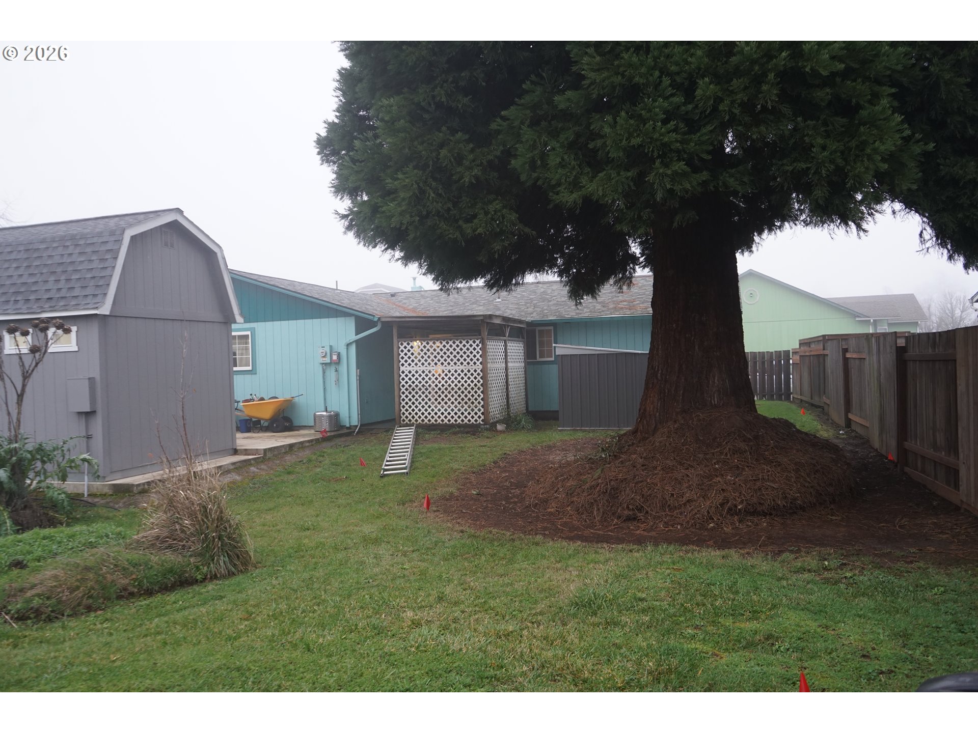 802 54th Place Springfield, OR 97478 - Photo 21 of 27 a view of backyard with green space