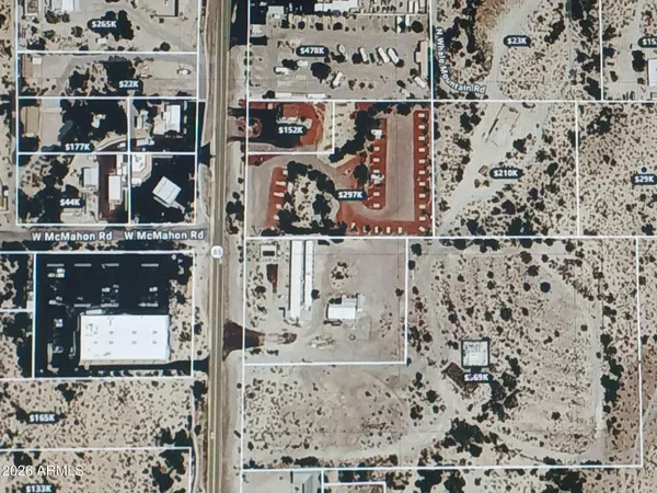 an aerial view of residential building and parking space