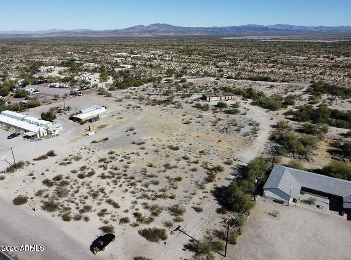 1940 North 2nd Avenue, Unit NULL Ajo, AZ 85321 - Photo 2 of 10 an aerial view of residential building and parking space