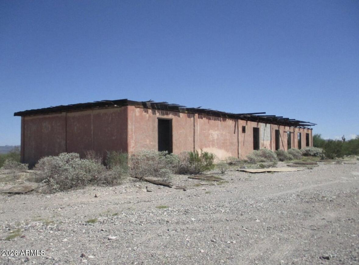 1940 North 2nd Avenue, Unit NULL Ajo, AZ 85321 - Photo 7 of 10 a view of a house with backyard space