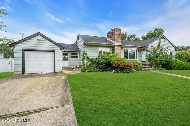 a front view of house with yard