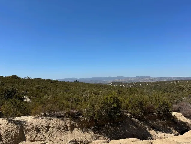 a view of lake and mountain