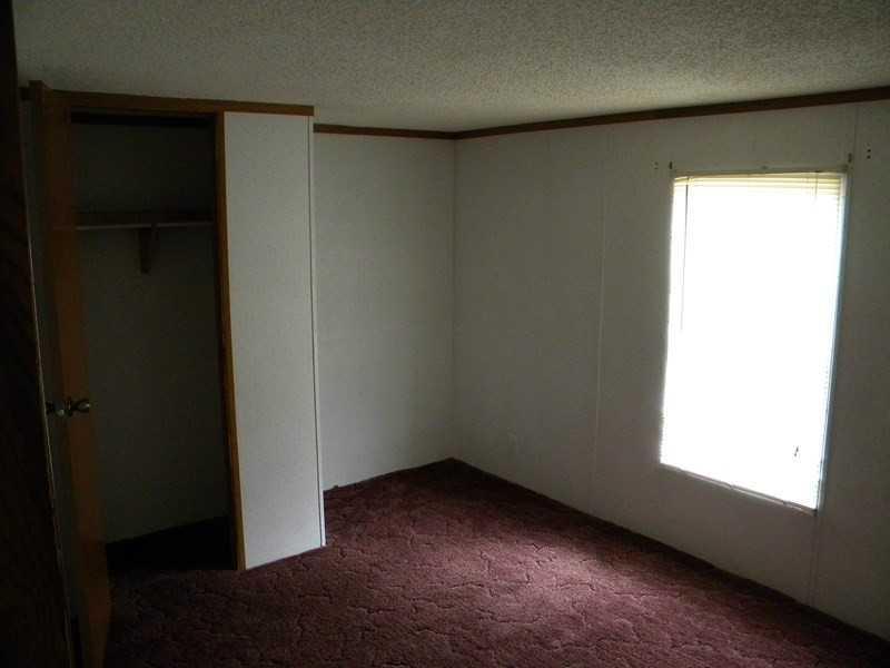 729 Vigue Road Windsor, ME 04363 - Photo 16 of 28 Bedroom. 3rd bedroom, faces backyard.