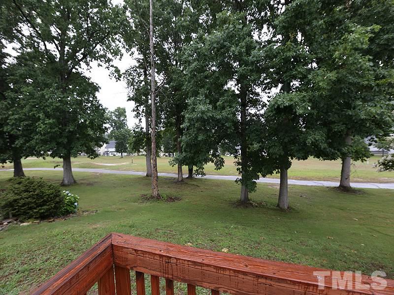 2172 Castle Pines Drive Raleigh, NC 27604 - Photo 12 of 15 Take in the view of the 15th fairway from the deck.