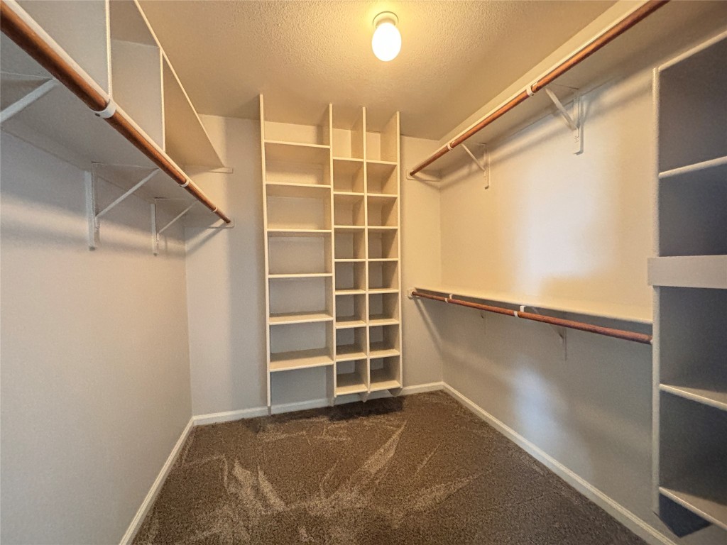 1702 McDowell Bend Leander, TX 78641 - Photo 5 of 13 a view of an empty room with a window