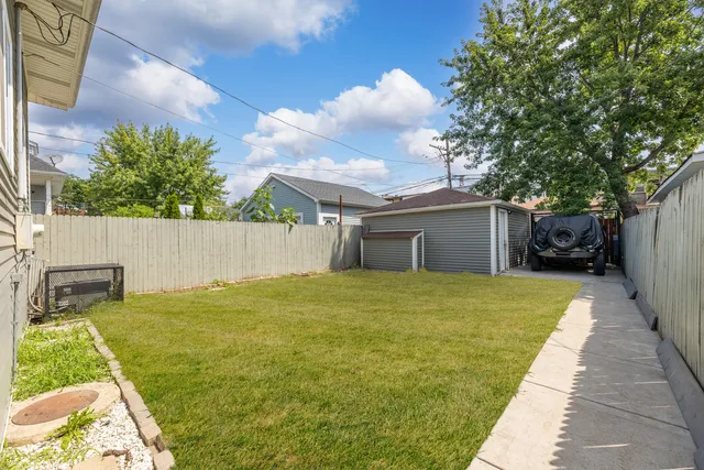 a bathroom with a sink and a yard