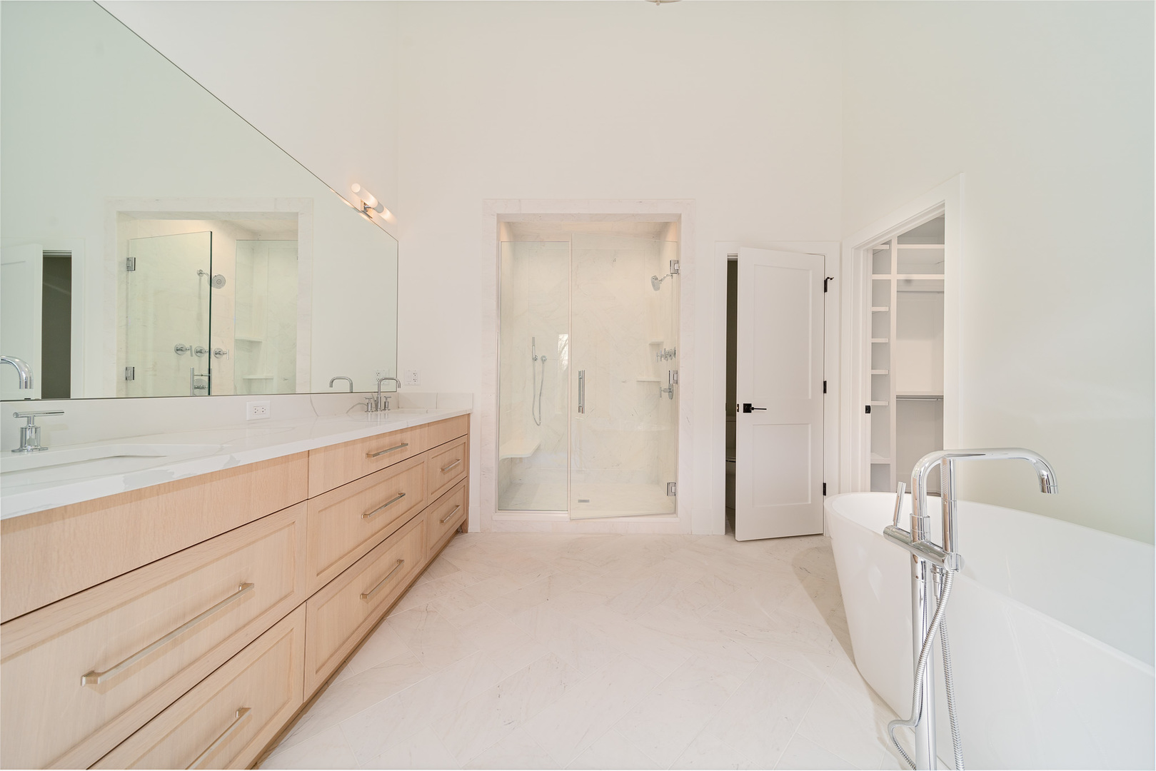2421 Sumac Circle Glenview, IL 60025 - Photo 13 of 27 a spacious bathroom with a double vanity sink mirror and double