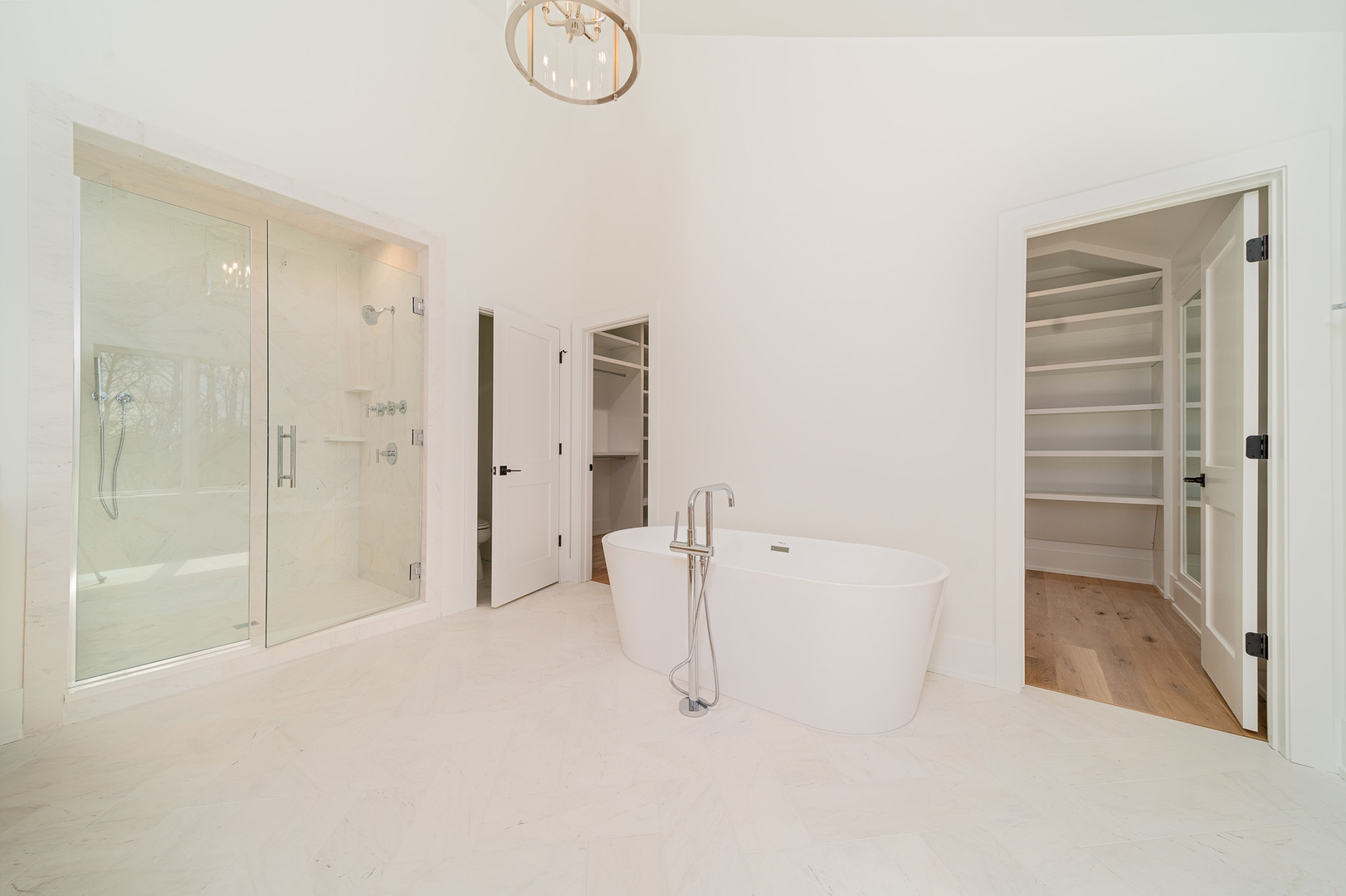 2421 Sumac Circle Glenview, IL 60025 - Photo 14 of 27 a bathroom with a shower and a glass door