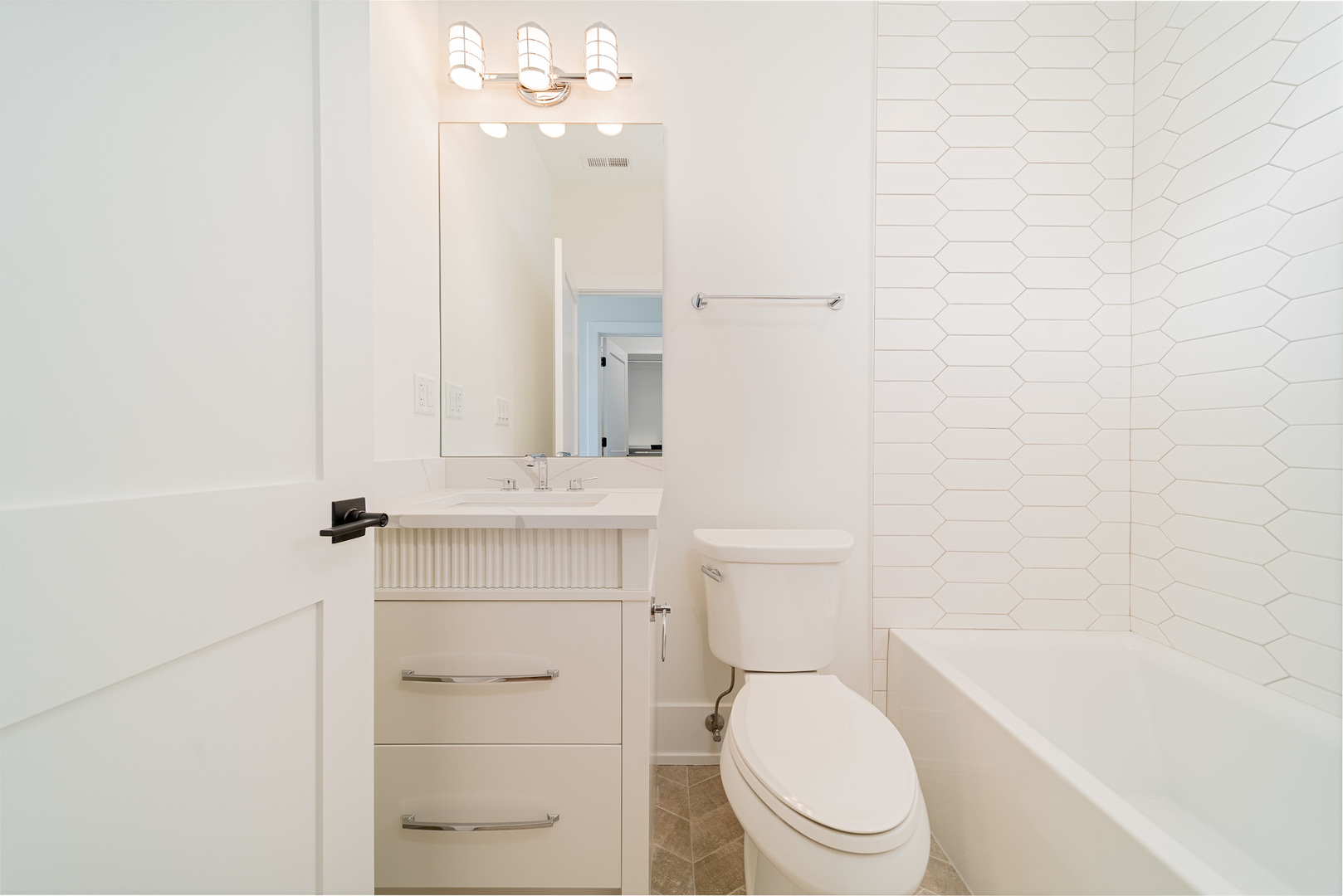 2421 Sumac Circle Glenview, IL 60025 - Photo 19 of 27 a bathroom with a sink a toilet and shower