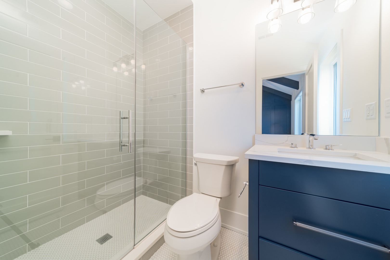 2421 Sumac Circle Glenview, IL 60025 - Photo 22 of 27 a bathroom with a sink toilet and shower