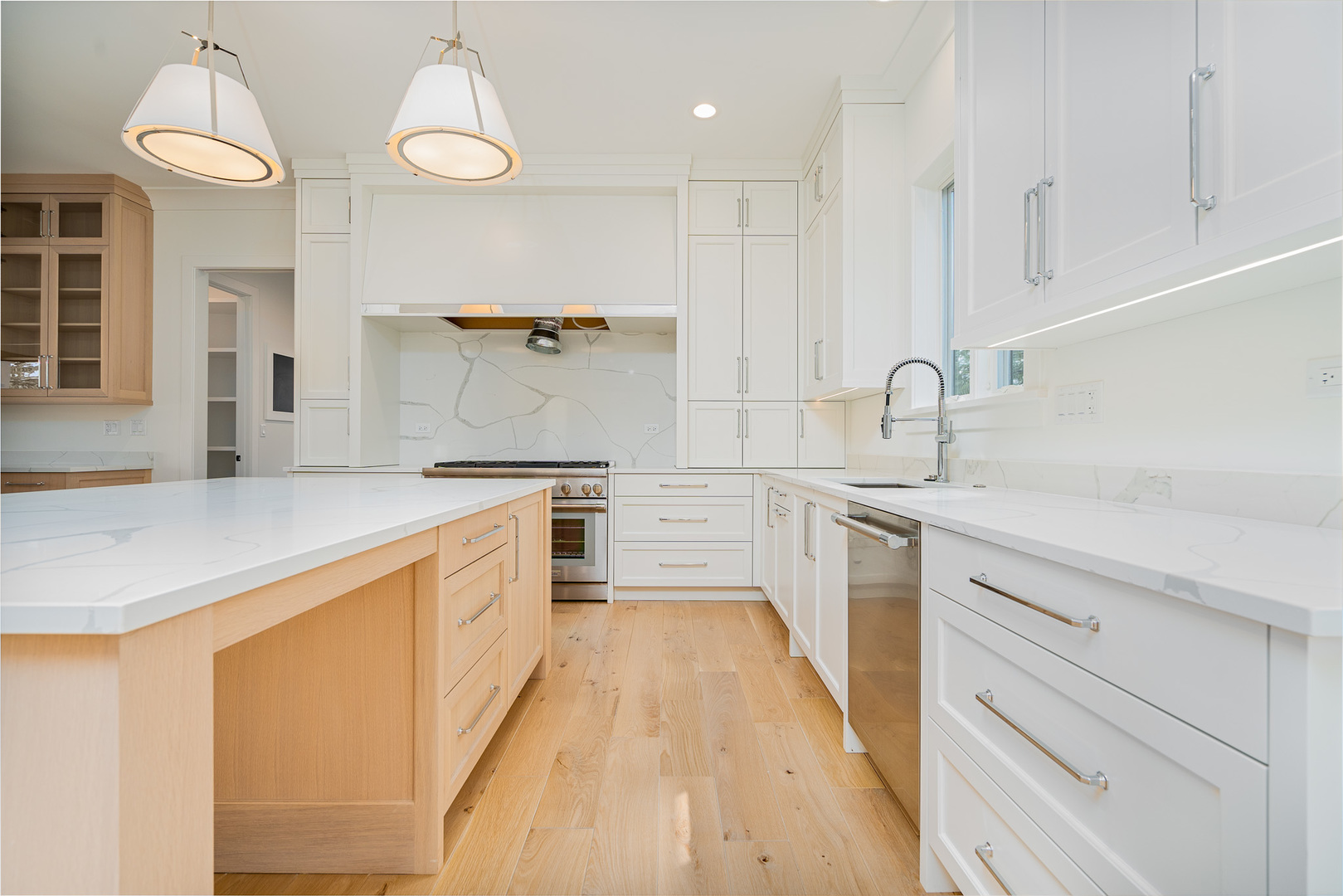 2421 Sumac Circle Glenview, IL 60025 - Photo 3 of 27 a kitchen with cabinets a sink and appliances