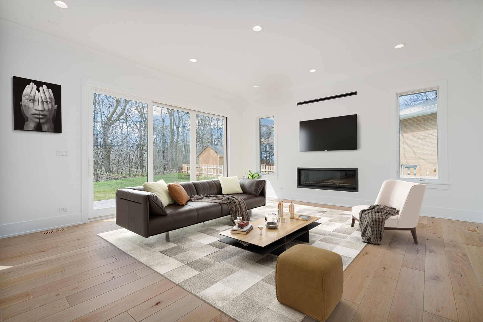 2421 Sumac Circle Glenview, IL 60025 - Photo 6 of 27 a living room with furniture a fireplace and a flat screen tv