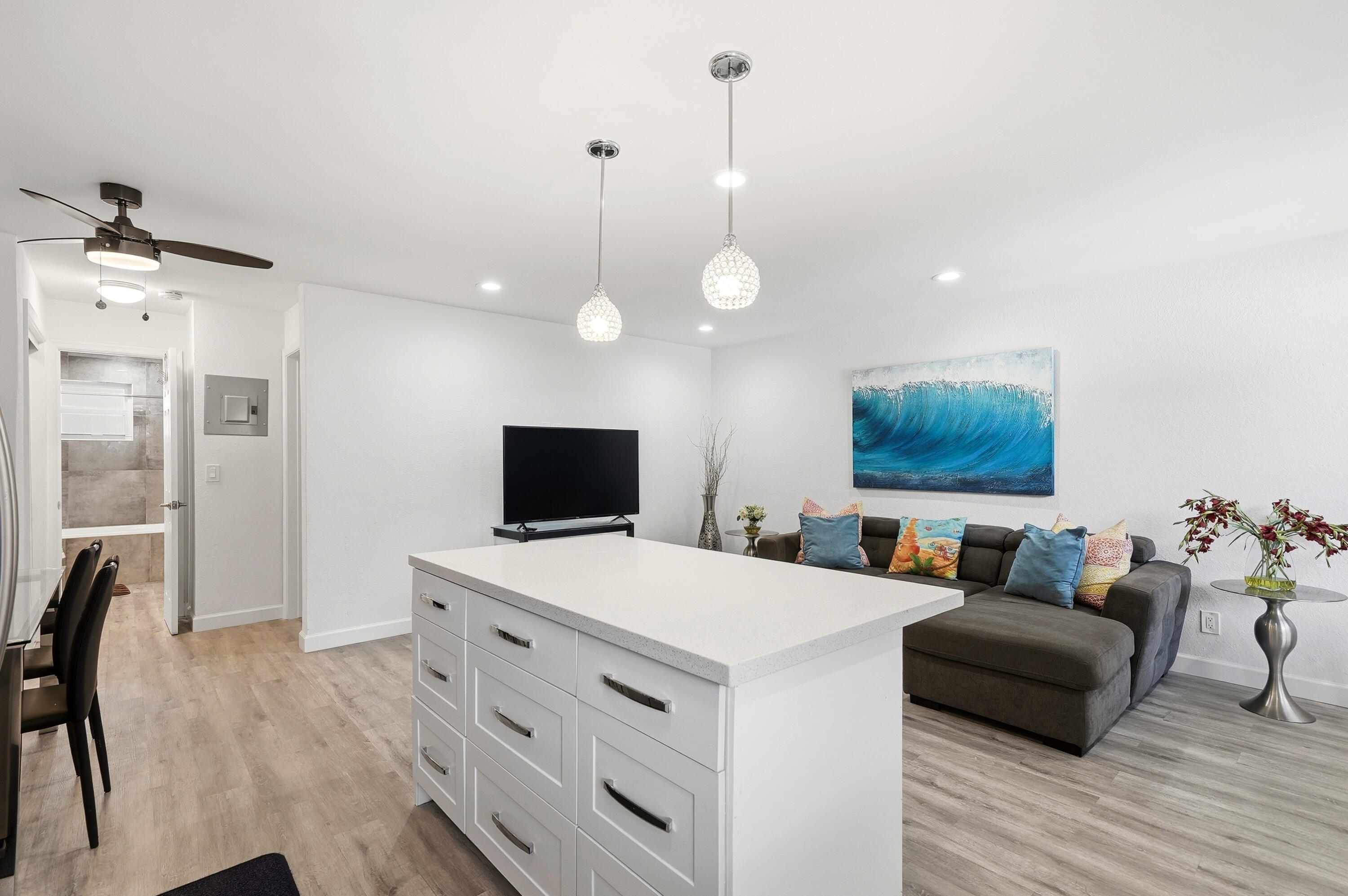 3510 Harrison Street, Unit 4 Hollywood, FL 33021 - Photo 8 of 31 a living room with furniture and a flat screen tv