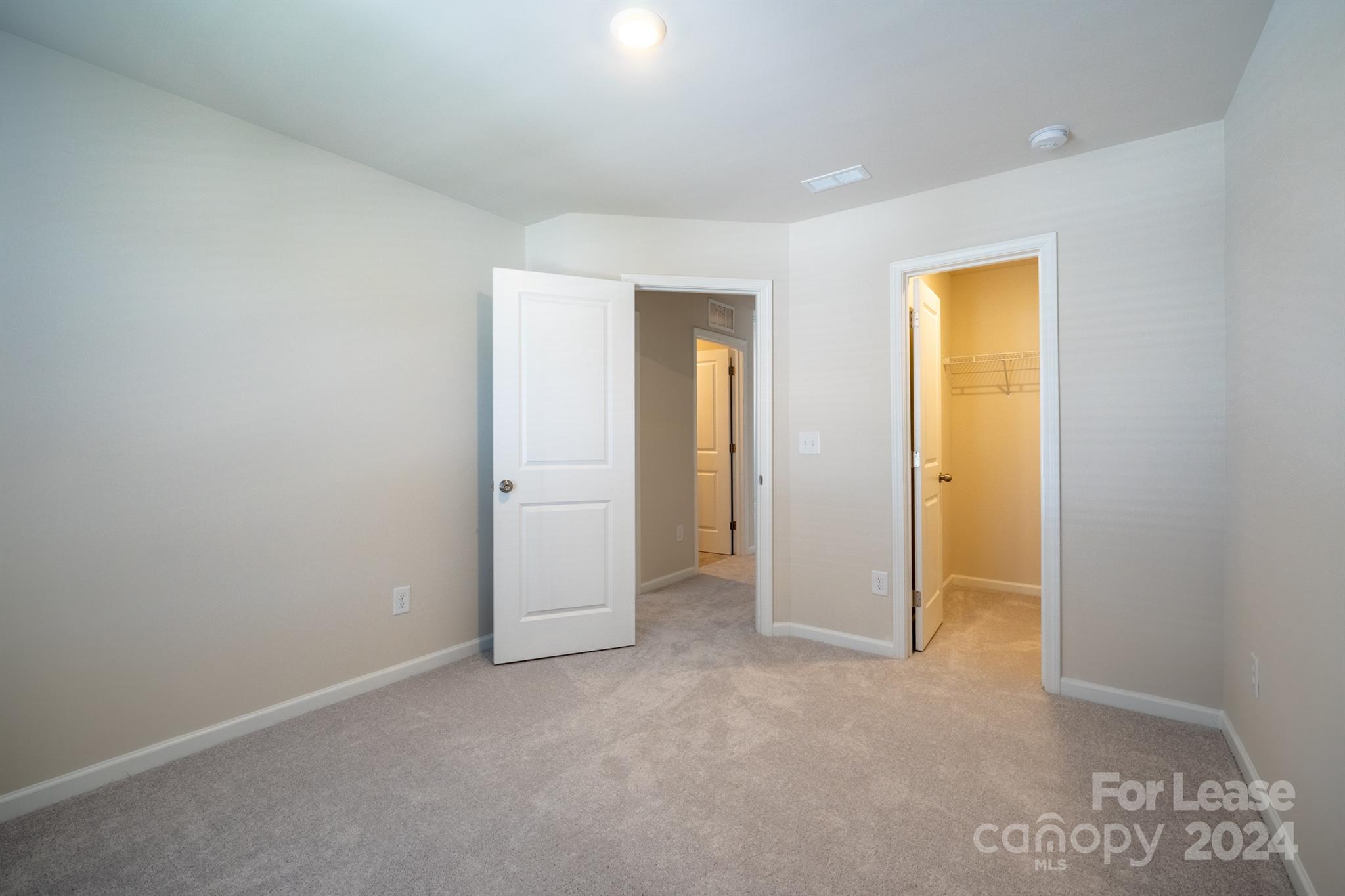 15307 Lake Ridge Road Charlotte, NC 28278 - Photo 17 of 33 an empty room with windows