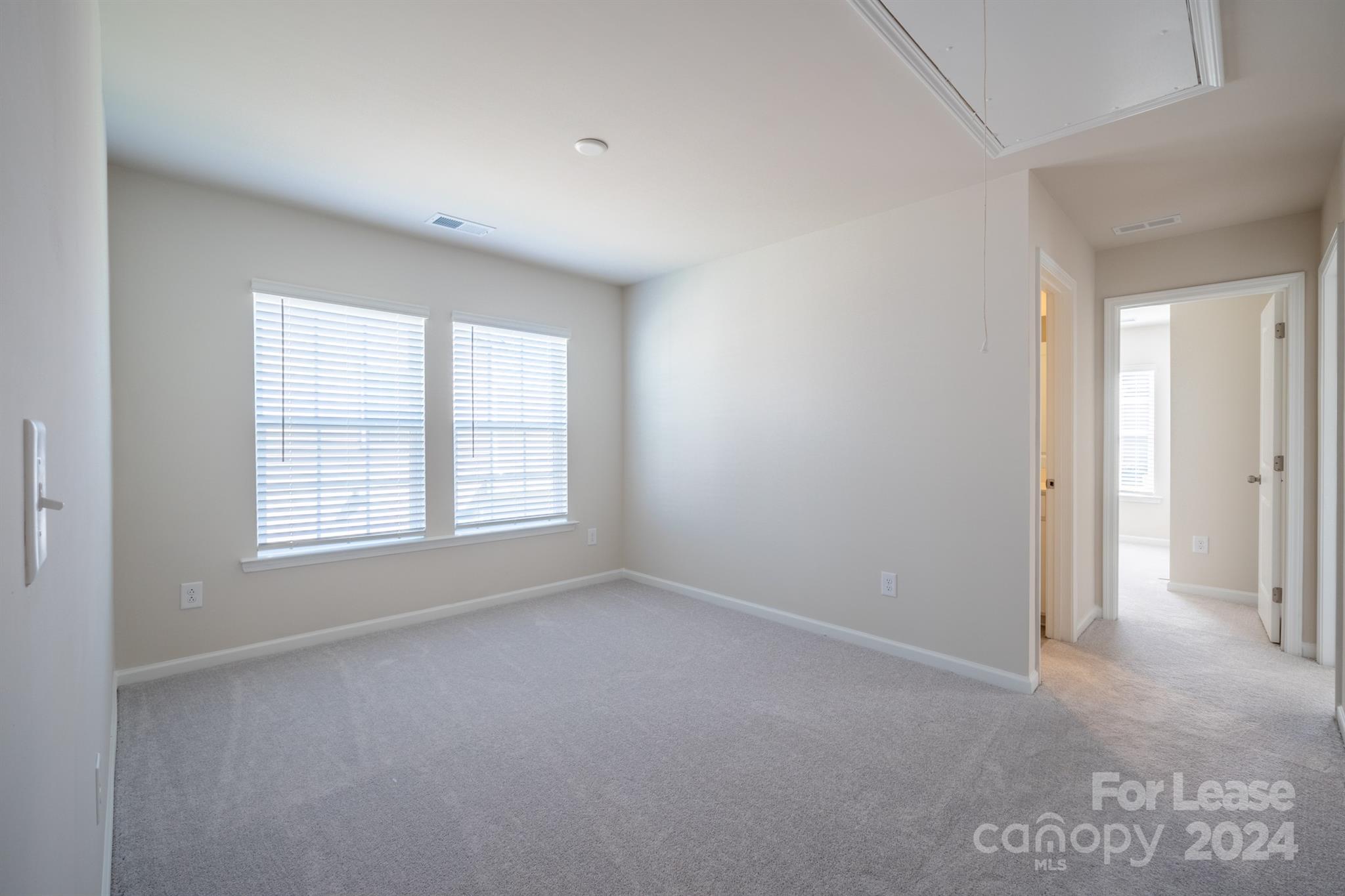 15307 Lake Ridge Road Charlotte, NC 28278 - Photo 21 of 33 a view of an empty room with a window