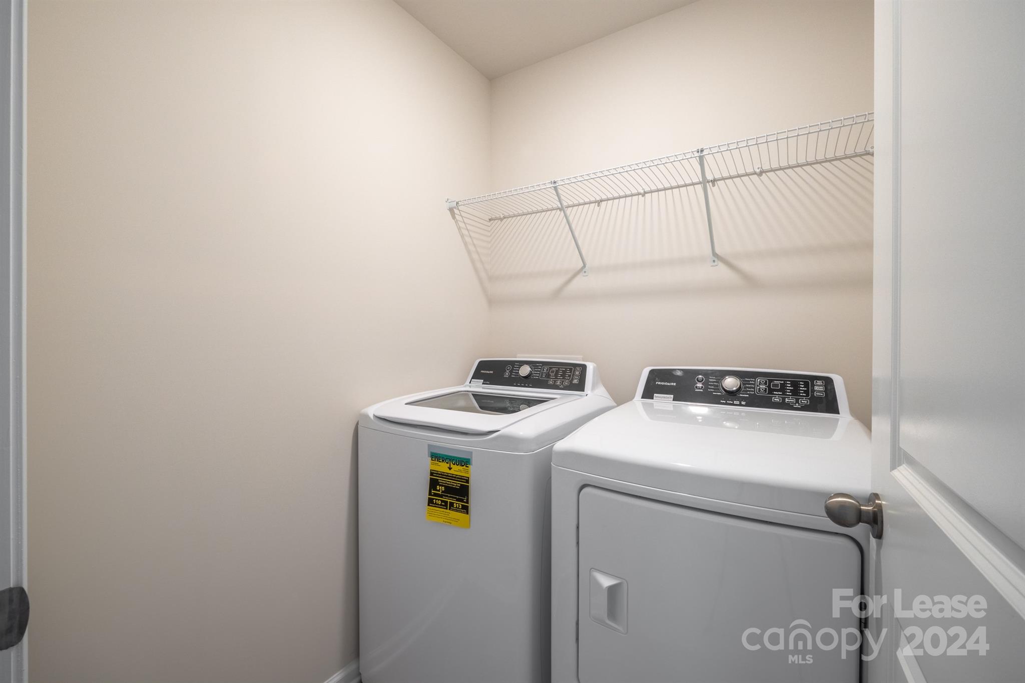 15307 Lake Ridge Road Charlotte, NC 28278 - Photo 22 of 33 a utility room with dryer and washer
