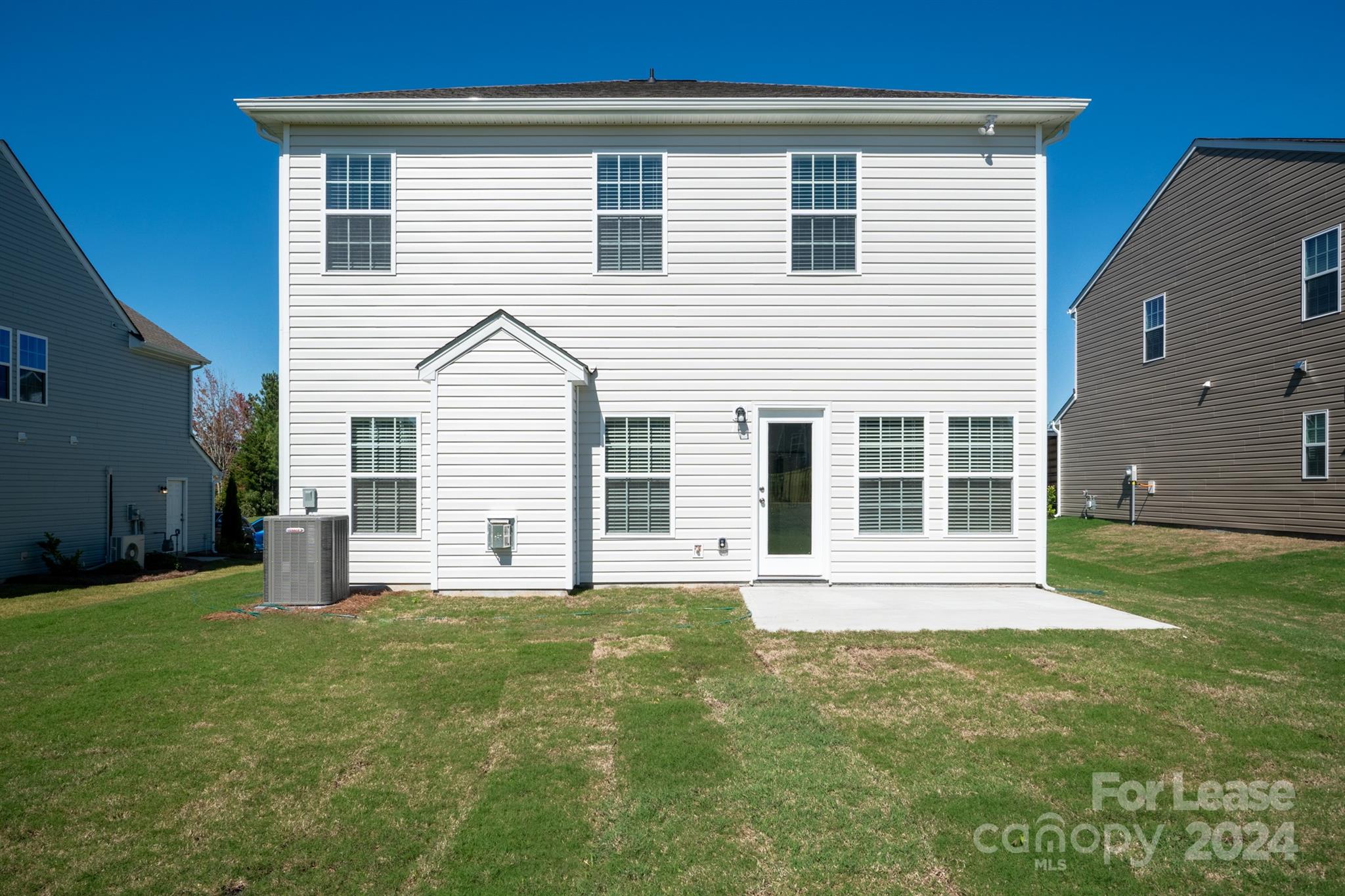 15307 Lake Ridge Road Charlotte, NC 28278 - Photo 33 of 33 a front view of a house with a yard