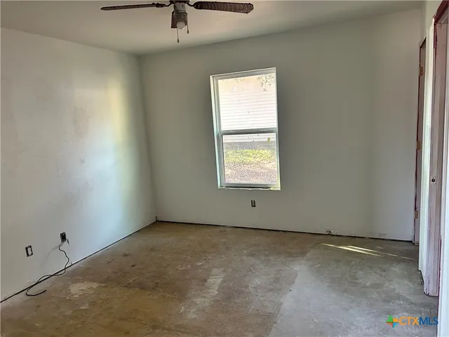 an empty room with a window