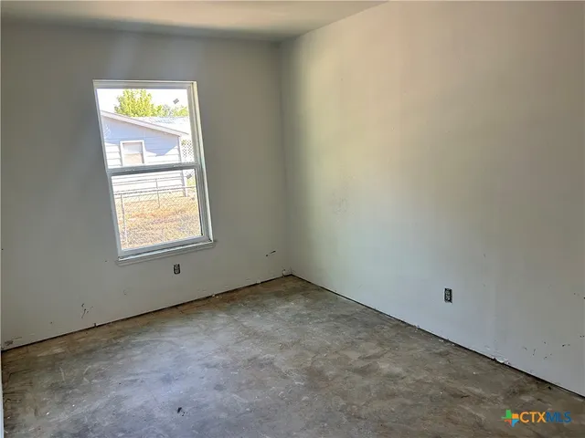 an empty room with a window