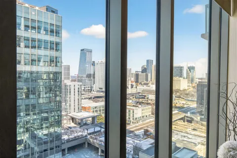 a kitchen with stainless steel appliances a stove and a sink