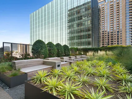 a view of a patio with couches table and chairs