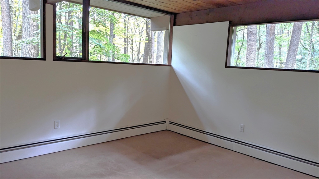 41 Belvedere Road Boxford, MA 01921 - Photo 13 of 16 a view of an empty room with a window
