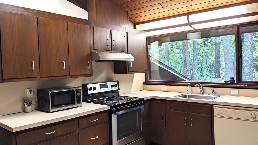 41 Belvedere Road Boxford, MA 01921 - Photo 3 of 16 a kitchen with a sink and a stove